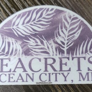 a purple and white sticker that says seacrests ocean city, md