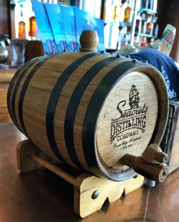 a wooden barrel sitting on top of a table
