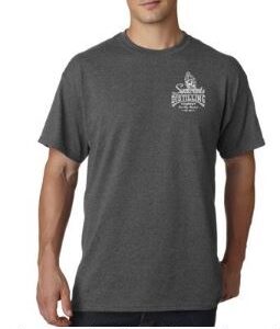 a man wearing a grey t - shirt with a crown on it