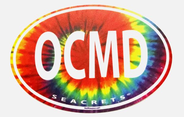 a circular sticker with the word ocmd on it
