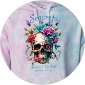 a tie dye hoodie with a skull and roses on it