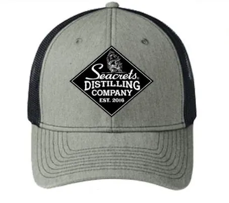 a gray and black trucker hat with a black patch on the front of it