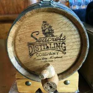 a wooden barrel sitting on top of a table