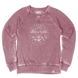 a women's sweatshirt with a graphic on the front