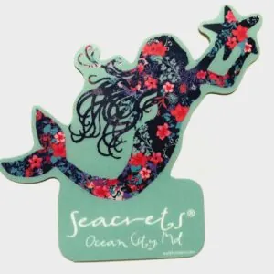 a sticker of a mermaid with flowers on it