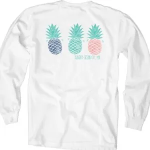 a white shirt with three pineapples on it